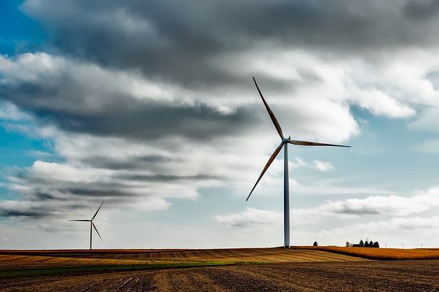how does a wind farm work - wind turbine against sky